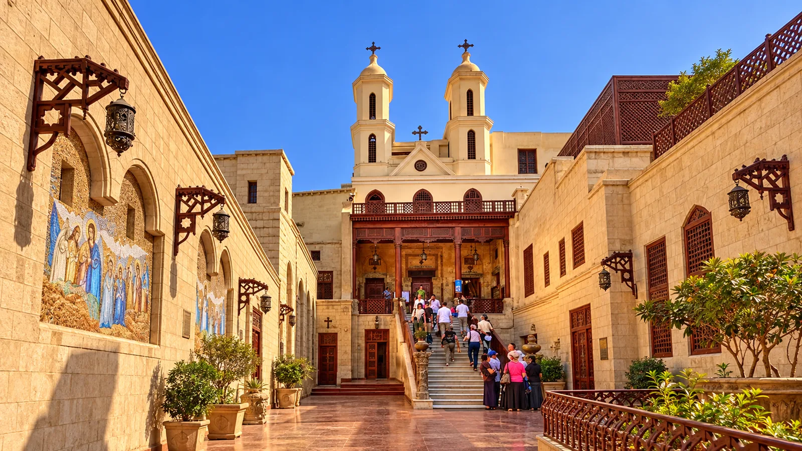 The Hanging Church and its twin bell towers at the top of a stone stairway in Coptic Cairo