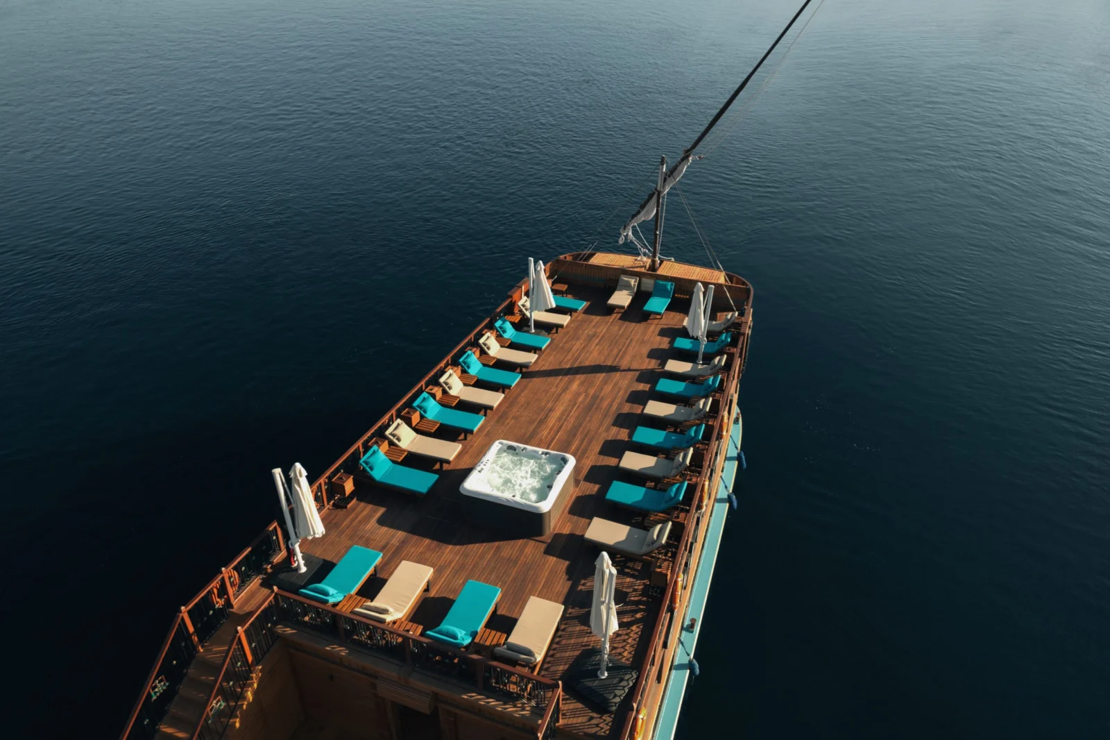 The on-board bar with carved wood and glowing onyx panels