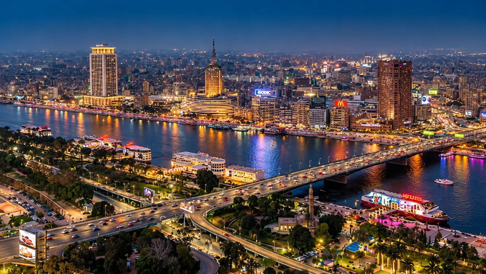 City lights reflected on the Nile at night