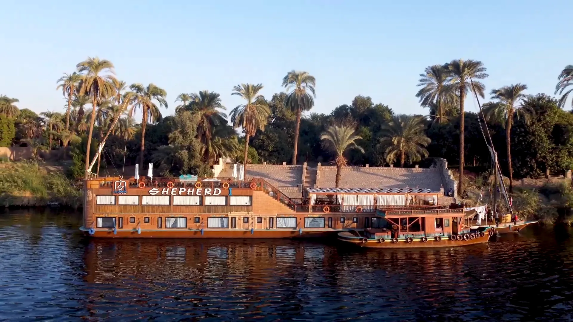 A dahabiya moored on the Nile